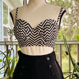 Like new. Xhilaration black and beige bikini top